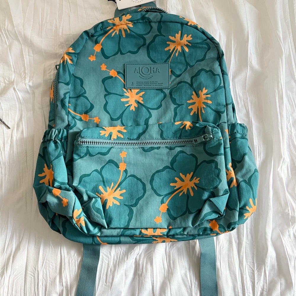 Floral Teal Backpack with Orange Accents